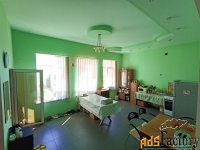 дом 210.00 м² на участке 20.00 сот.