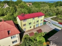коттедж 1475.5 м² на участке 42 сот.