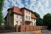 дом 1001.2 м² на участке 14.75 сот.