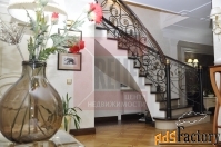 дом 488.7 м² на участке 6 сот.