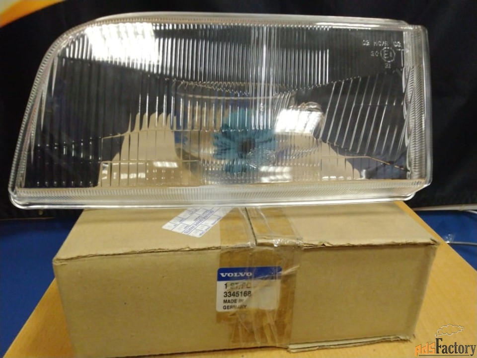 Стекло фары Вольво 460 95-
