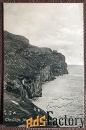 Антикварная открытка Лландино. Скалистый берег. Англия