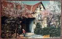 Антикварная открытка В саду. Рубка дров