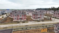 коттедж 186.58 м² на участке 5.5 сот.