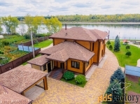 коттедж 219 м² на участке 24.54 сот.