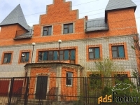 дом 608.1 м² на участке 21.8 сот.