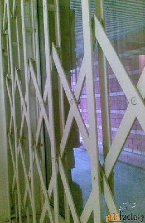 раздвижные решетчатые металлические двери